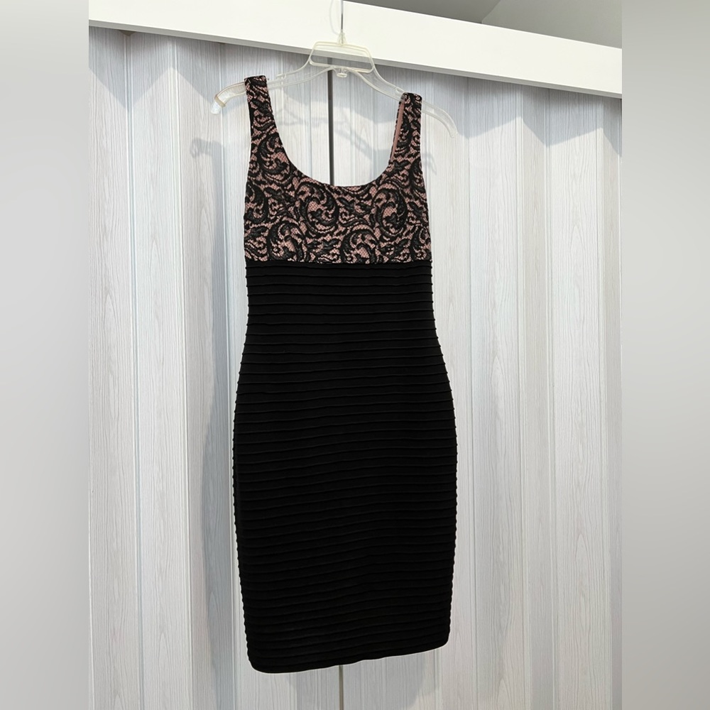 Great form fitting dress.
